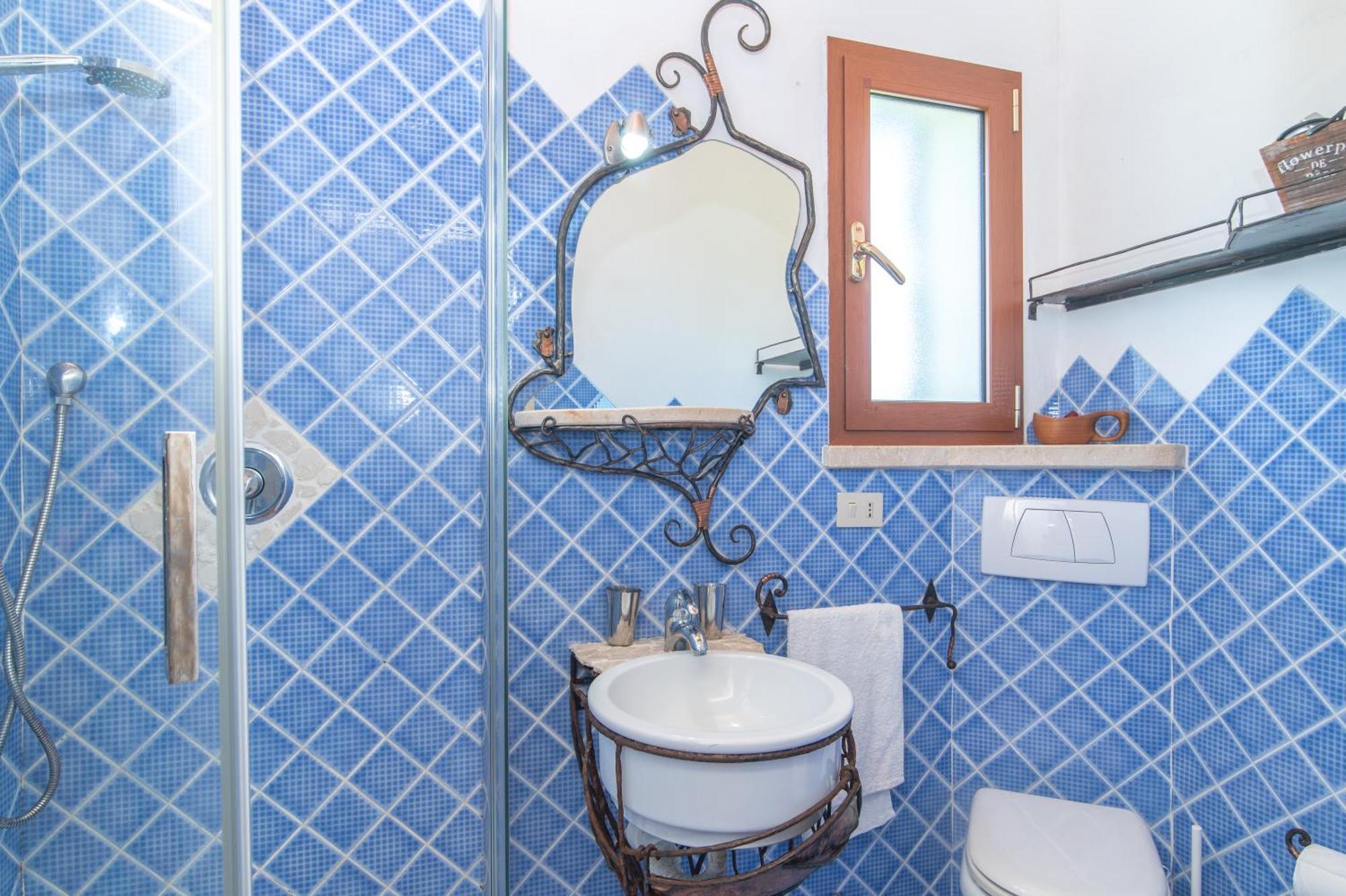Susy House Baja Sardinia Exterior foto
